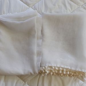 2 sheer white pom pom curtain panels